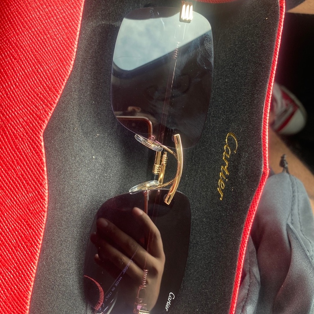 New black tint Cartier shades
